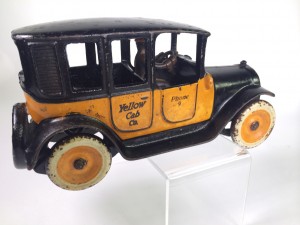 Yellow Cab Co.-call number 9. Cast Iron toy by Arcade.