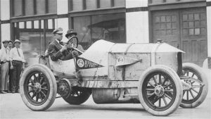 Similar Race car from the Era to Kenton cast iron race car, showing large faceted engine bay and cowl.