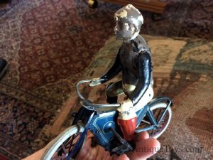 Old toy motorcycle picture.