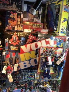 a Beautiful tin toy assortment along with diecast were on display at Mandarake, within Tokyo Japan 
