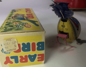 toy bird. Old windup tin toys.