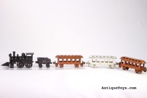 Dent Cast Iron train for sale. Note its difficult to find colors of orange and white.