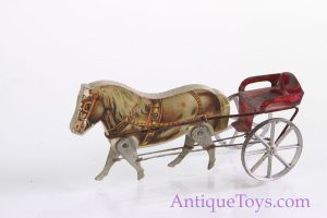 Old Toy picture of a Gibbs wood and tin horse toy with carriage