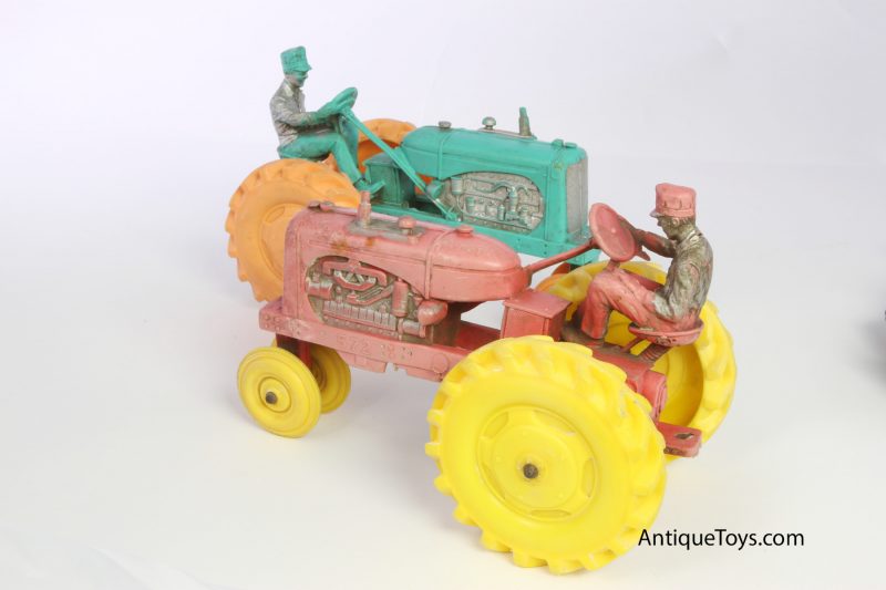 Two Auburn Rubber co. toy tractors