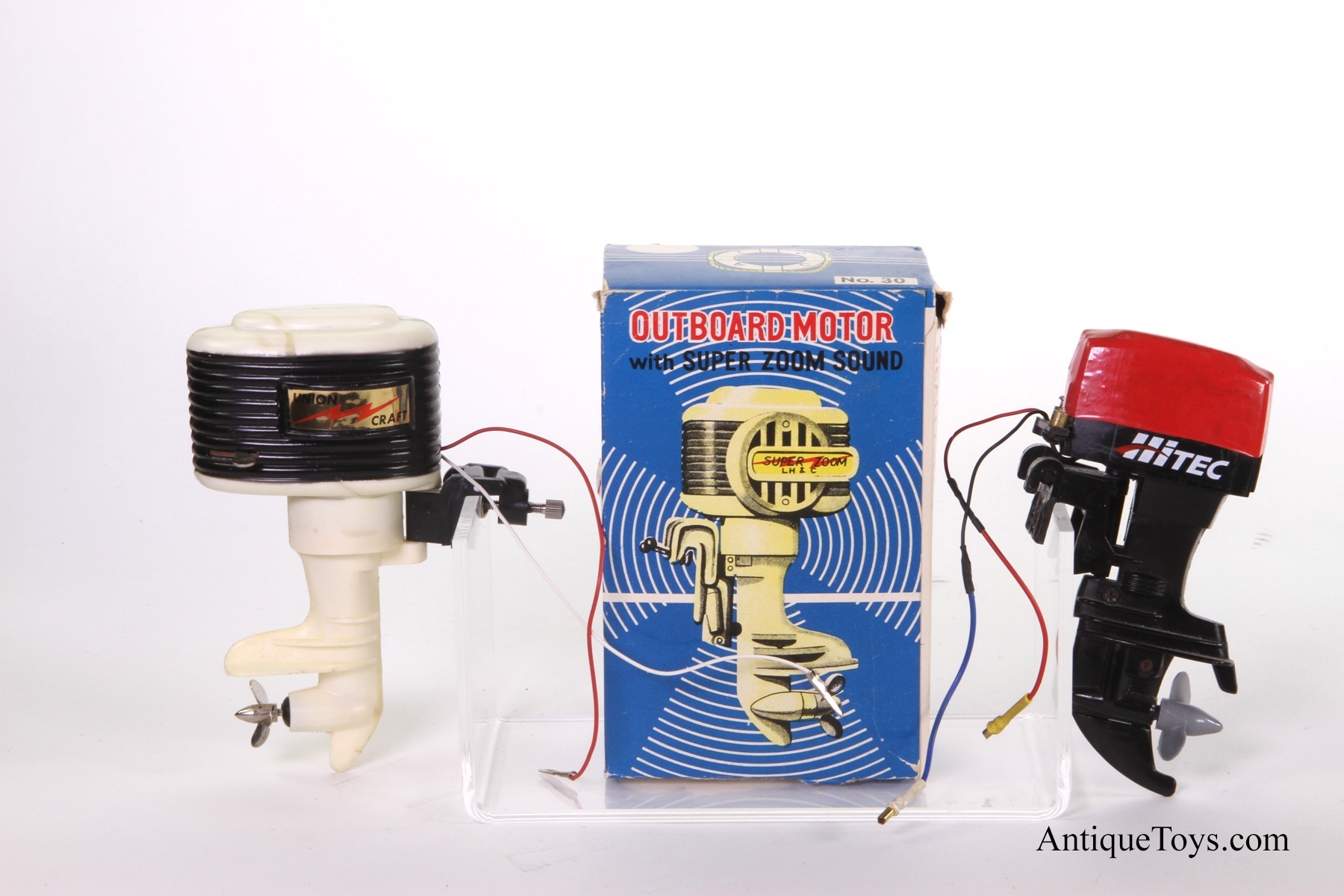 Toy boat engine outlet