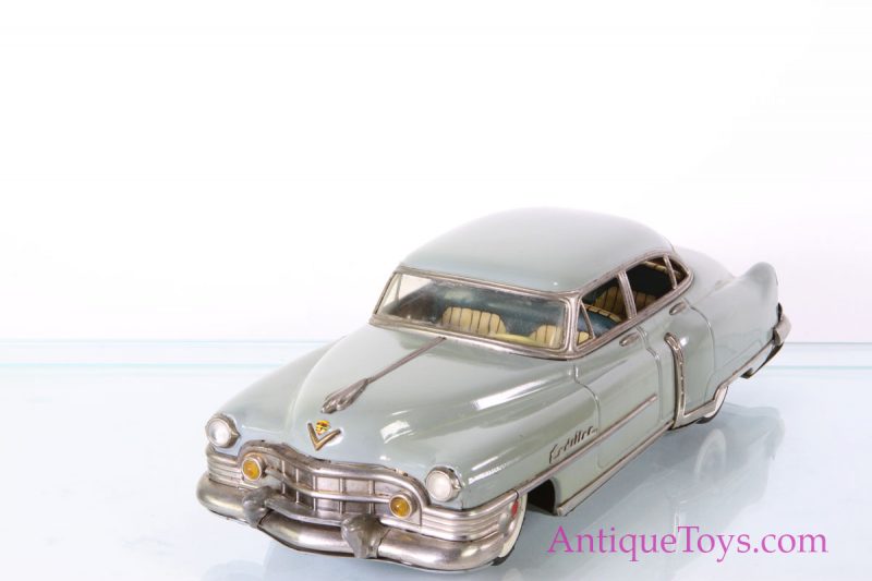 Marusan Shoten Tin-Cars Friction powered Cadillac Series 62 Sedan <FONT COLOR="ff000 ">*SOLD*</font> - Image 7