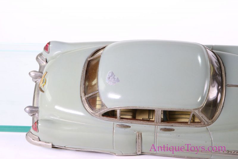 Marusan Shoten Tin-Cars Friction powered Cadillac Series 62 Sedan <FONT COLOR="ff000 ">*SOLD*</font> - Image 10