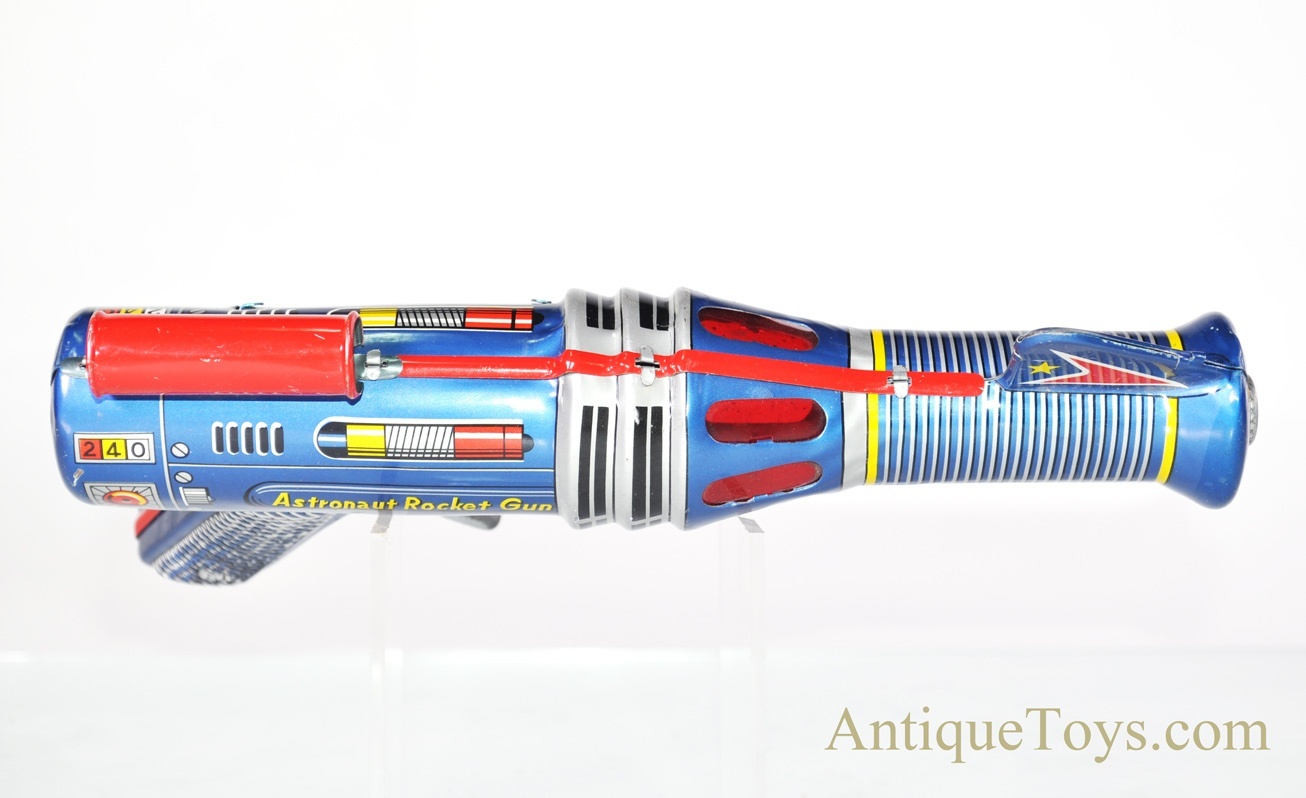 Daiya Tin Lithographed Friction Siren Astronaut Rocket Gun Daiya Tin Lithographed Friction Siren Astronaut Rocket Gun