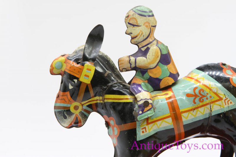 Gama Toys Tin Lithographed Windup Clown on Rocking Horse *SOLD*