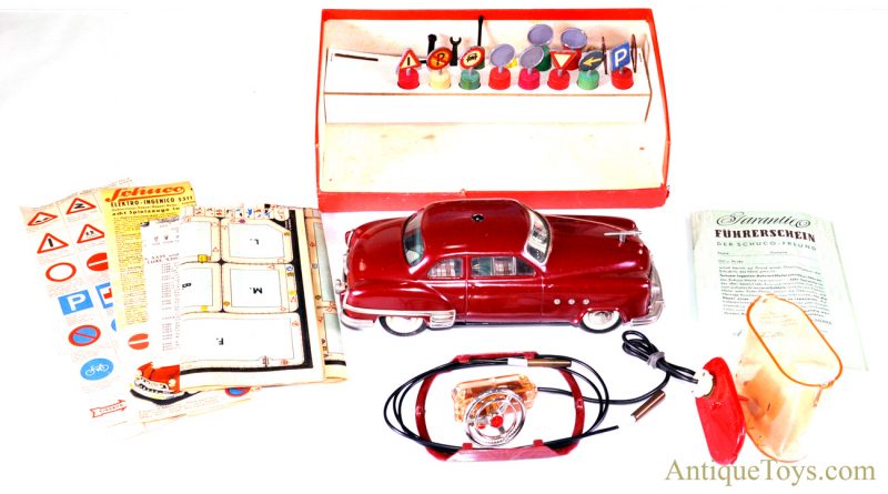 Schuco Elektro Ingenico 5311 German Tin Litho Battery Op. Remote Controlled Maroon Sedan with Box & Accessories <FONT COLOR="ff000 ">*SOLD*</font> - Image 2