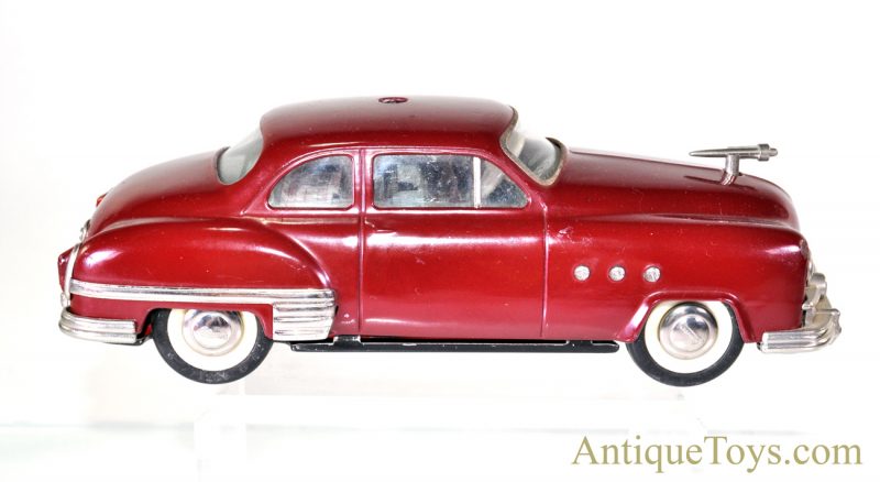 Schuco Elektro Ingenico 5311 German Tin Litho Battery Op. Remote Controlled Maroon Sedan with Box & Accessories <FONT COLOR="ff000 ">*SOLD*</font> - Image 5