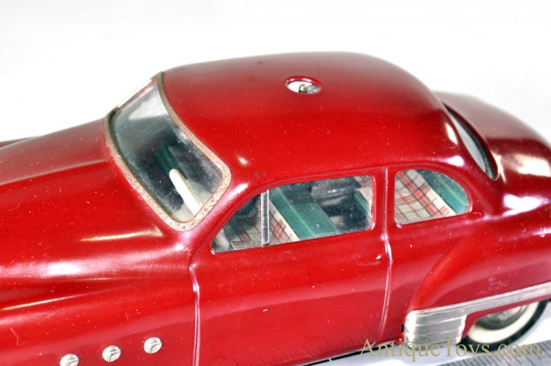 Schuco Elektro Ingenico 5311 German Tin Litho Battery Op. Remote Controlled Maroon Sedan with Box & Accessories <FONT COLOR="ff000 ">*SOLD*</font> - Image 10