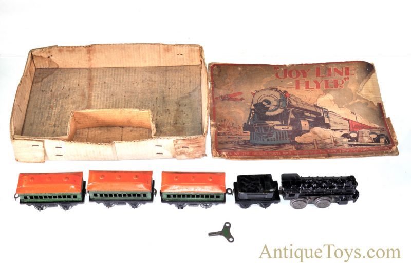 Girard Joy Line Flyer “O” Gauge Lithograph Wind Up Cast Iron Locomotive with #357 Tin Coach Train Cars and Box for Sale <FONT COLOR="ff000 ">*SOLD*</font>