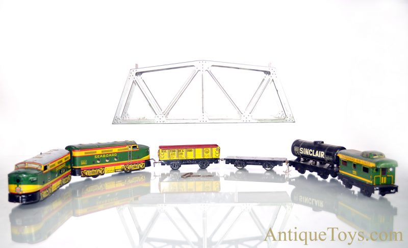 Marx O-Gauge 7pc. Tin Lithographed Train Set #4000 Seaboard Clockwork & Dummy A-Unit Diesel Locomotive with #956 Caboose, B&O Coal, Flat & Sinclair Tank Cars & Illinois Central Trestle Bridge for Sale