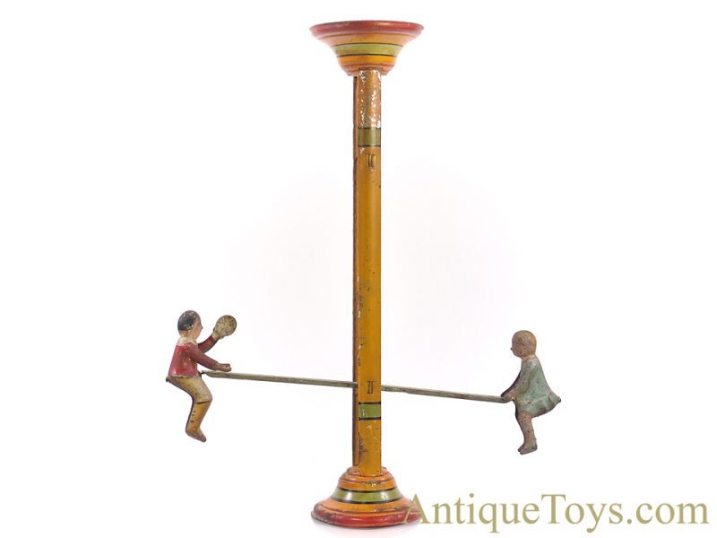 Gibbs Mfg. Co. Flip Over Tin Hand Painted Boy & Girl on Teeter Totter Toy - Image 3