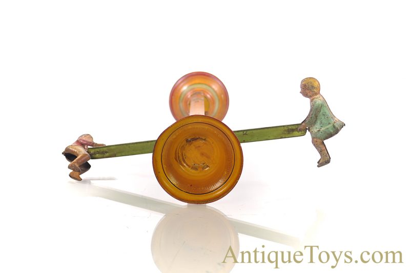 Gibbs Mfg. Co. Flip Over Tin Hand Painted Boy & Girl on Teeter Totter Toy - Image 5