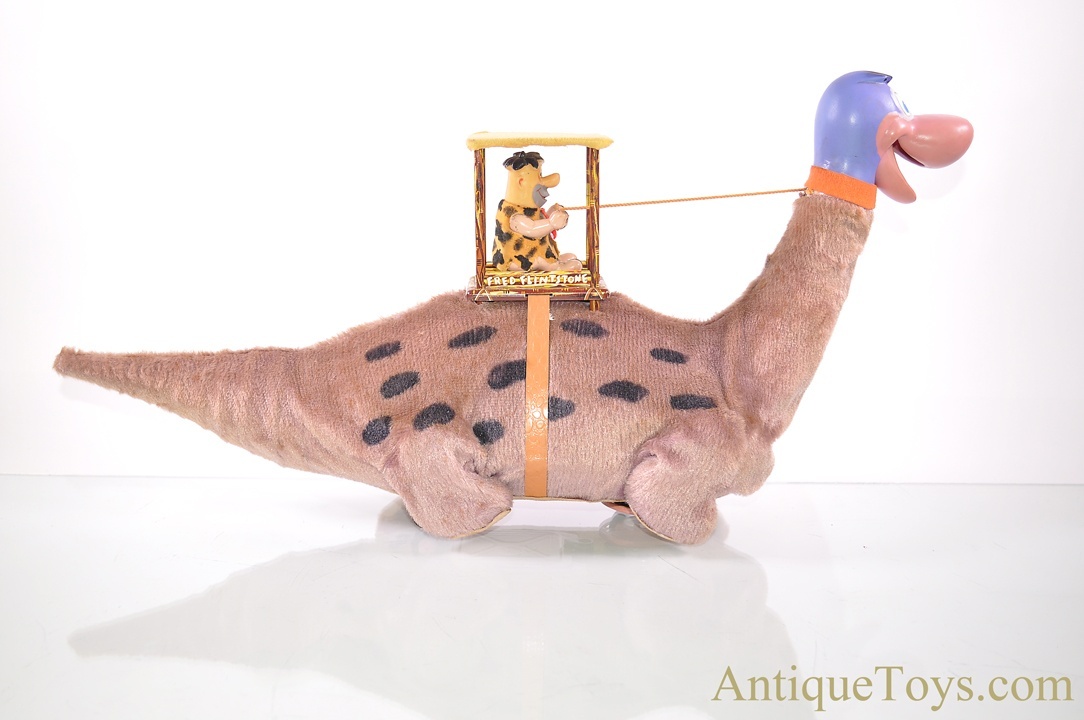Marx ca. 1960's Lithographed Tin “Fred on Dino” Flintstones Battery  Operated Toy *SOLD*  - Antique Toys for Sale