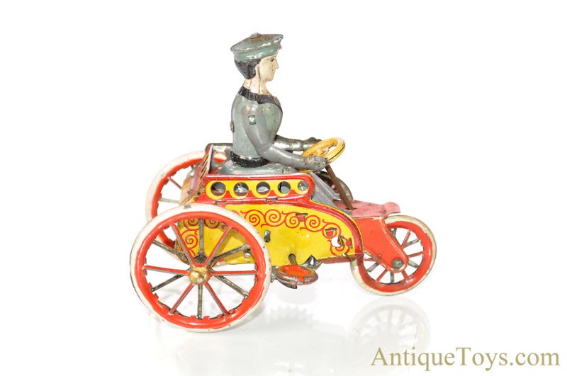 Walter Stock Pre-War Lithographed Windup Tin Penny Toy Woman in Car for Sale