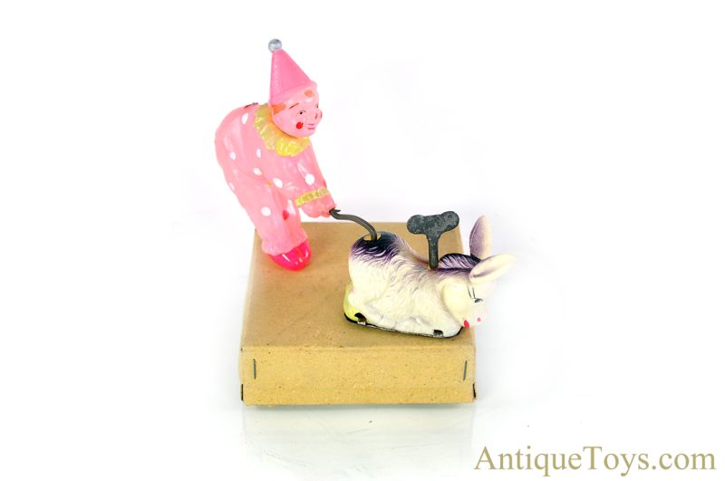 KT Occupied Japan (OJ) Celluloid Windup "The Obstinate Donkey" Circus Clown Toy for Sale