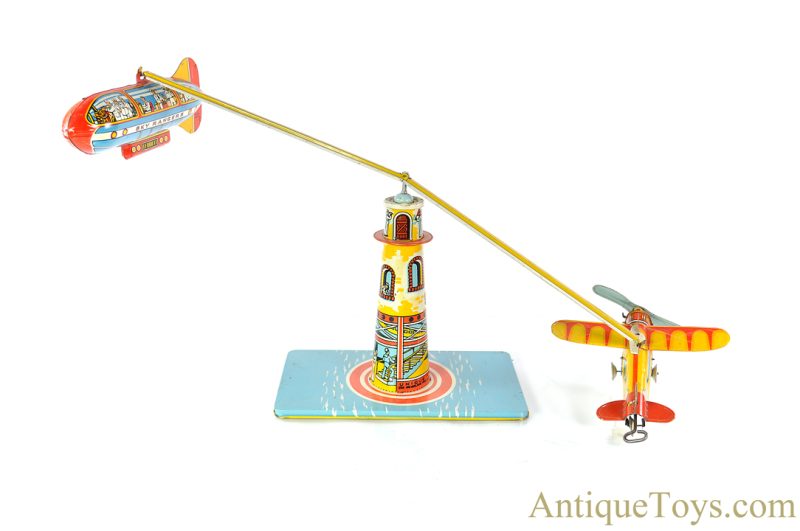 Unique Art ca. 1930's Tin Lithographed Windup “Sky Rangers” Zeppelin & Airplane Carousel Toy <FONT COLOR="ff000 ">*SOLD*</font>