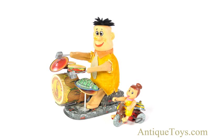 Frankonia Tin Lithographed Battery Operated "Fred Flintstone" Bedrock Band" & Linemar/Marx Wilma Flintstone Windup Tricycle for Sale <FONT COLOR="ff000 ">*SOLD*</font>