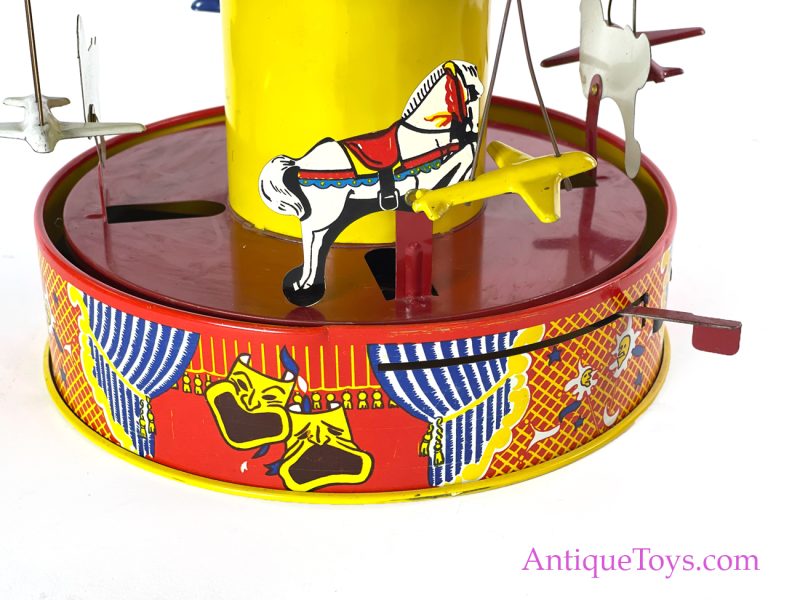 Wolverine Supply & Mfg. Tin Lithographed Lever Action No. 76 "Carousel" Circus Merry Go Round with Planes and Horses in Box <FONT COLOR="ff000 ">*SOLD*</font> - Image 4