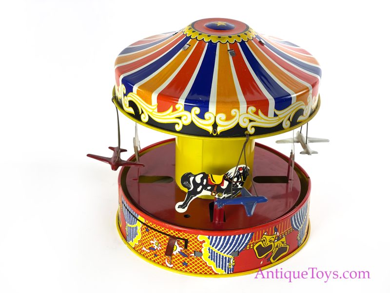 Wolverine Supply & Mfg. Tin Lithographed Lever Action No. 76 "Carousel" Circus Merry Go Round with Planes and Horses in Box <FONT COLOR="ff000 ">*SOLD*</font> - Image 2