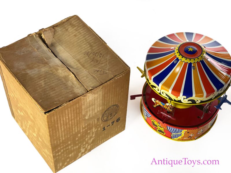 Wolverine Supply & Mfg. Tin Lithographed Lever Action No. 76 "Carousel" Circus Merry Go Round with Planes and Horses in Box <FONT COLOR="ff000 ">*SOLD*</font>