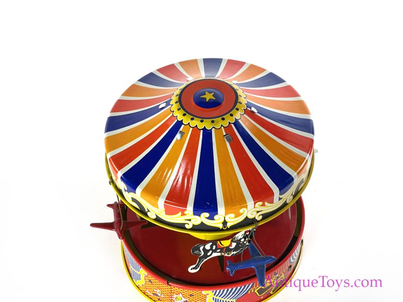 Wolverine Supply & Mfg. Tin Lithographed Lever Action No. 76 "Carousel" Circus Merry Go Round with Planes and Horses in Box <FONT COLOR="ff000 ">*SOLD*</font> - Image 3