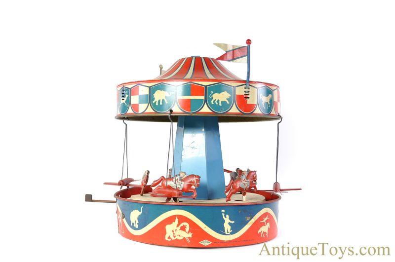 Wolverine Supply & Mfg. Tin Lithographed Lever Action No. 31A "Merry-Go-Round" Circus Carousel with Planes and Horses <FONT COLOR="ff000 ">*SOLD*</font>