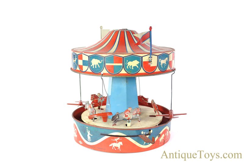 Wolverine Supply & Mfg. Tin Lithographed Lever Action No. 31A "Merry-Go-Round" Circus Carousel with Planes and Horses <FONT COLOR="ff000 ">*SOLD*</font> - Image 2