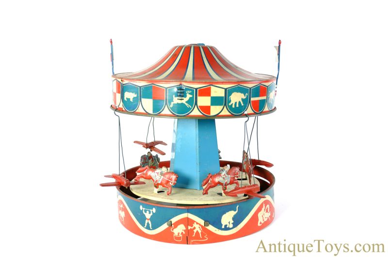 Wolverine Supply & Mfg. Tin Lithographed Lever Action No. 31A "Merry-Go-Round" Circus Carousel with Planes and Horses <FONT COLOR="ff000 ">*SOLD*</font> - Image 3