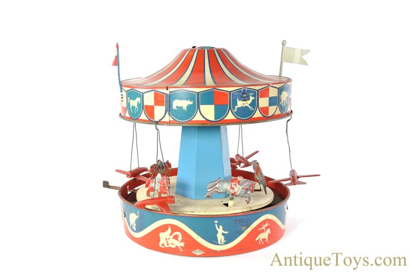 Wolverine Supply & Mfg. Tin Lithographed Lever Action No. 31A "Merry-Go-Round" Circus Carousel with Planes and Horses <FONT COLOR="ff000 ">*SOLD*</font> - Image 4