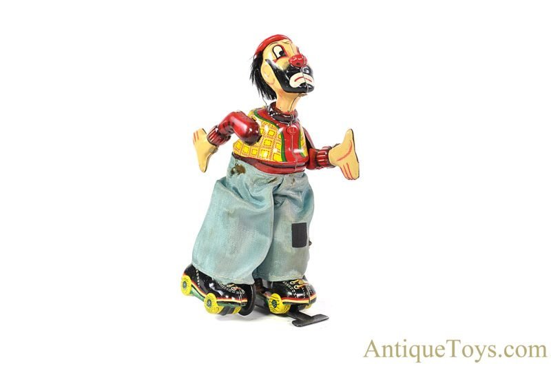 TPS Toplay, Ltd. Tin Lithographed Windup "Mechanical Clown on Roller Skate" Japanese Toy <FONT COLOR="ff000">*SOLD*</font>