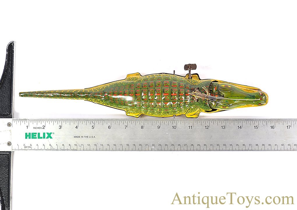 J. Chein Tin Lithographed Windup Native on Alligator *SOLD J. Chein Tin Lithographed Windup Native on Alligator *SOLD