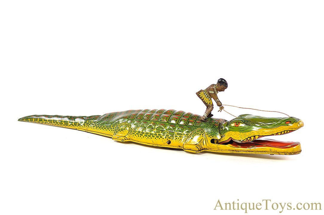 J. Chein Tin Lithographed Windup Native on Alligator *SOLD J. Chein Tin Lithographed Windup Native on Alligator *SOLD