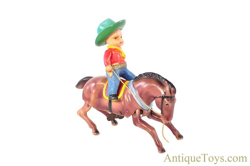 Masudaya Modern Toys (MT) Occupied Japan Celluloid Windup Cow Boy on Bucking Bronco <FONT COLOR="ff000 ">*SOLD*</font>