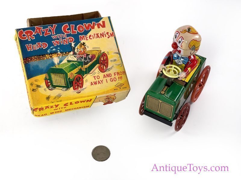 Yonezawa Tin Lithographed Windup Crazy Clown Vintage Tin Toy with Box for Sale