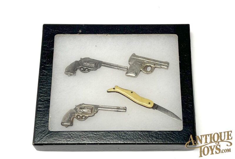 Arcade Miniature Guns & Miniature Faux Ivory Pocket Knife in Riker Box for Sale