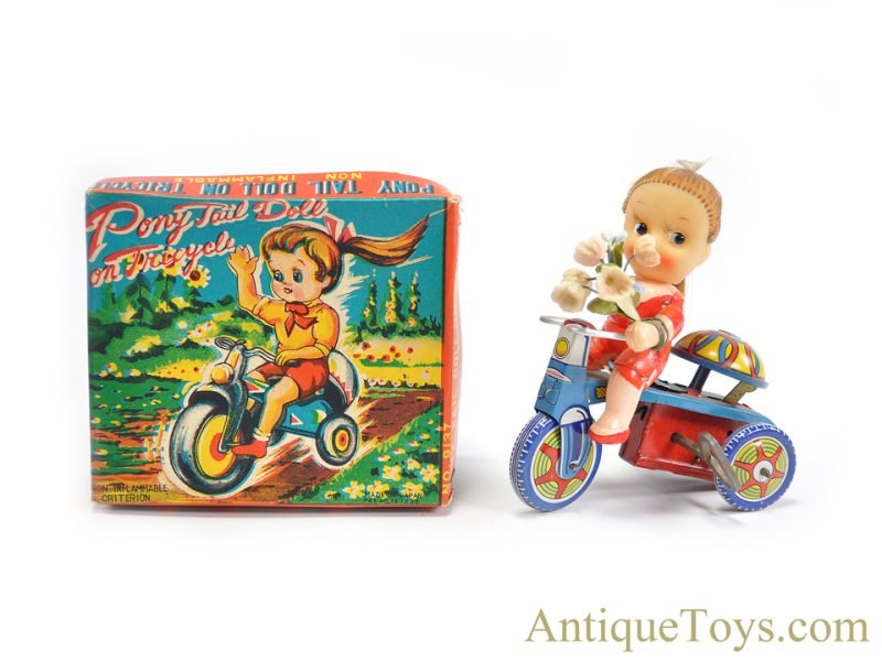 Kanto Toys Tin Lithographed Windup No. 9137 "Pony Tail Doll on Tricycle" in Box Japanese Toy <FONT COLOR="ff000 ">*SOLD*</font>