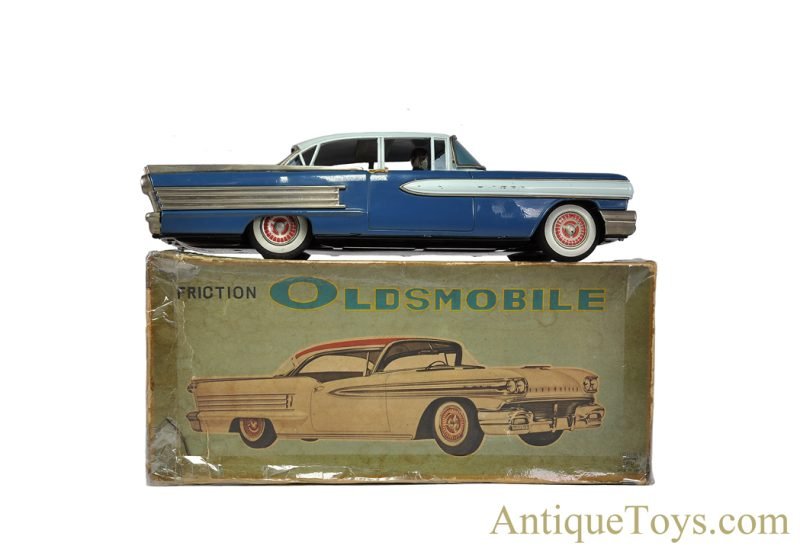 Yonezawa (Y) & Ichiko Toys Large Tin Lithographed Friction Oldsmobile with Driver in Box <FONT COLOR="ff000 ">*SOLD*</font>