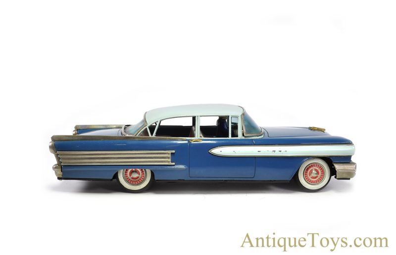 Yonezawa (Y) & Ichiko Toys Large Tin Lithographed Friction Oldsmobile with Driver in Box <FONT COLOR="ff000 ">*SOLD*</font> - Image 2