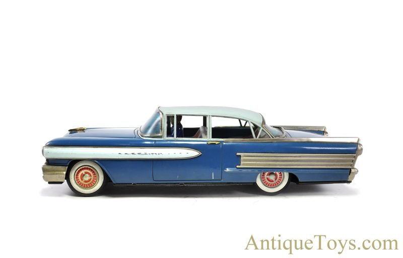 Yonezawa (Y) & Ichiko Toys Large Tin Lithographed Friction Oldsmobile with Driver in Box <FONT COLOR="ff000 ">*SOLD*</font> - Image 3