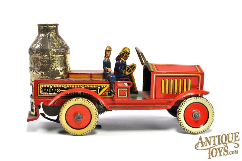 Pre-War Arnold Tin Lithographed Windup Large Fire Engine with Sparking Boiler & Small No. 640 Box for Sale - Image 2