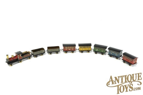 Johann Distler (J.D.N.) Tin Lithographed No. 100 Tin Penny 8pc. Train Set for Sale