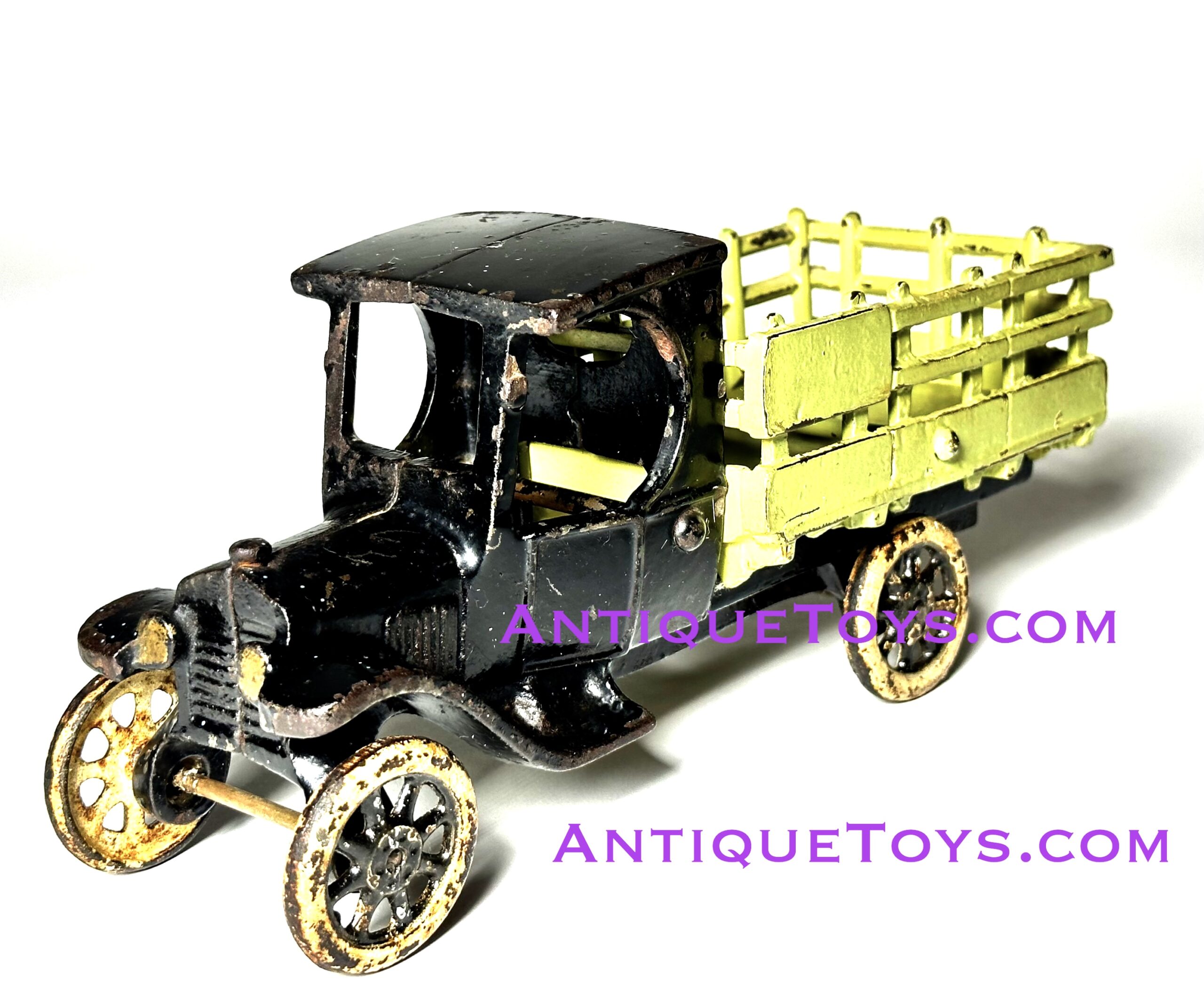 Buying and Auctioning Arcade cast iron toys like this arcade Toys Stake Truck circa 1923