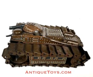Prewar Japanese tin toy tank with treads. Japanese toy