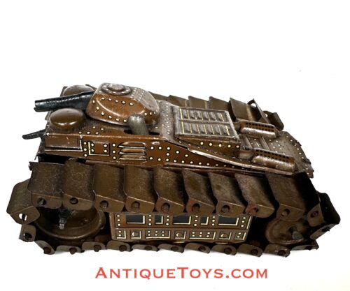 Prewar Japanese tin toy tank with treads. Japanese toy