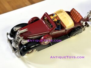 Beautiful Tom Sehloff toys cast iron Chrysler convertible with nickel plated parts.