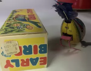 toy bird. Old windup tin toys.